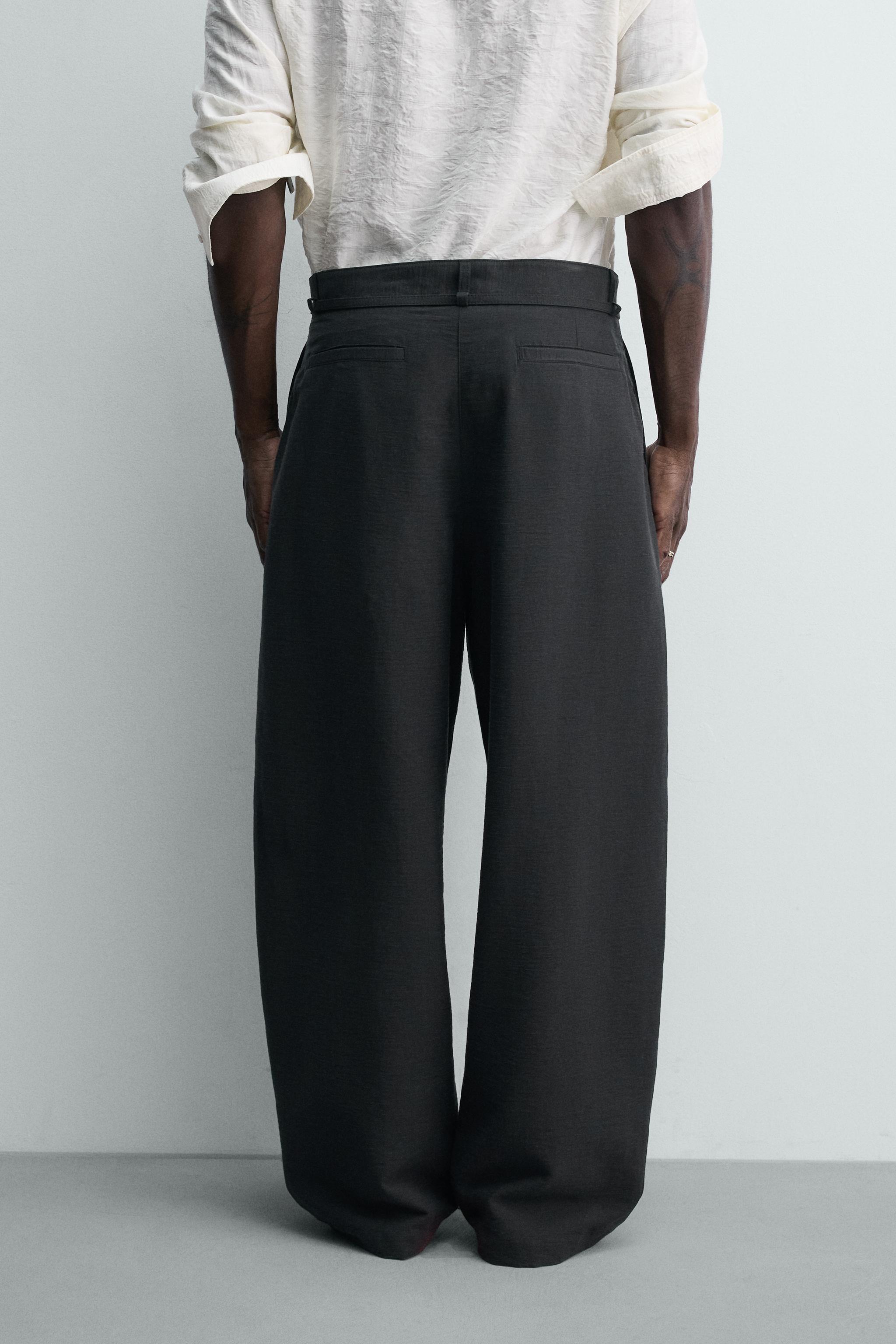 BALLOON FIT PLEATED BELTED PANTS